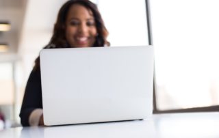 Woman using laptop