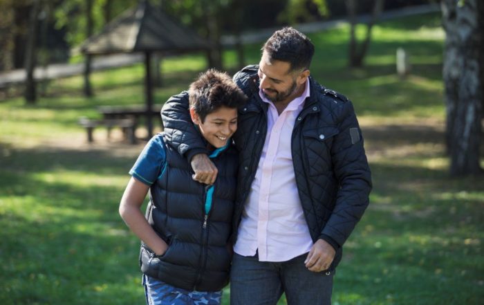 Father and son in a park