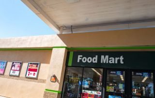 Food Mart with cigarette ads