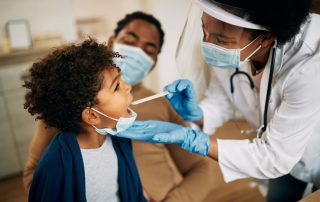 Health care worker and child