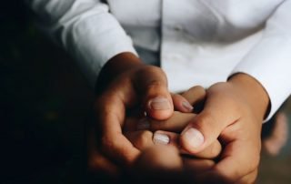 Photo of holding hands by Matheus Ferrero on Unsplash
