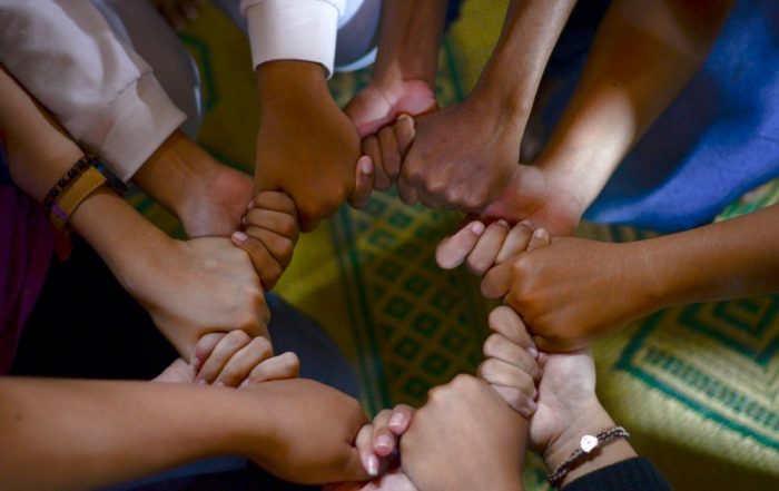 Holding hands in a circle